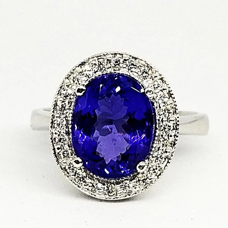 Engagement rings with sapphires for women-18kt White Gold Halo Oval Tanzanite Ring with Diamonds