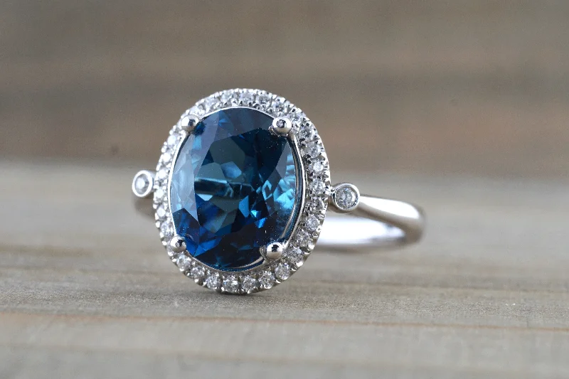 Two-tone engagement rings for women-10x8mm London Blue Topaz Oval Diamond Halo Ring M3095