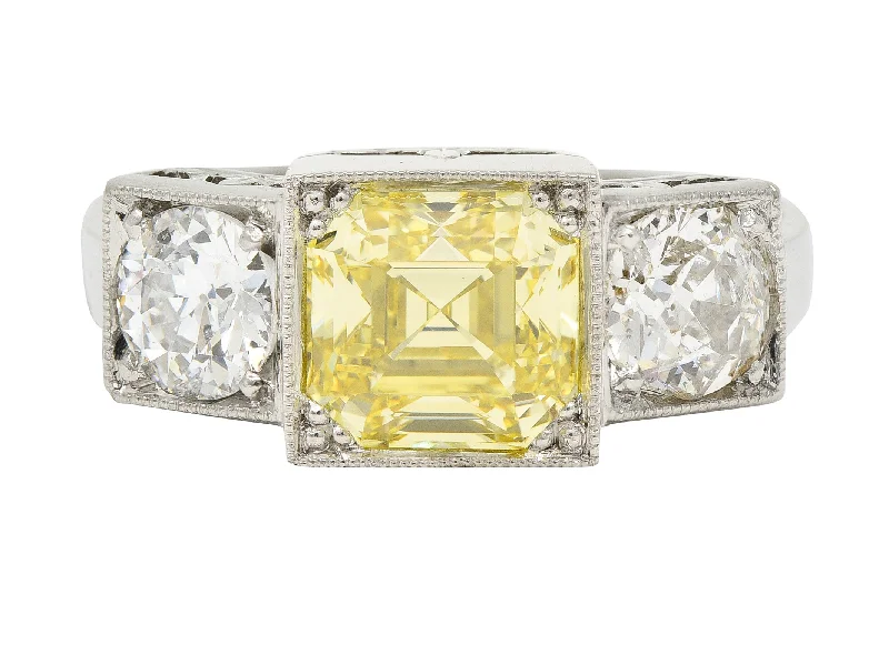 Geometric ring for women-Art Deco 3.20 CTW Asscher Cut Fancy Intense Yellow & Old European Cut Diamond Platinum Foliate Vintage Ring GIA